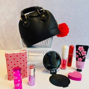 Black Mini Handbag with Red Pom Pom